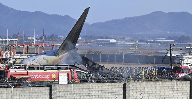 韩国客机起火已致58人死亡